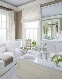 A bedroom surrounded with windows makes finding practical and stylish window treatments a challenge. Classy Roman Shades Bathroom Window Treatments Bathroom Window Curtains Small Bathroom Window