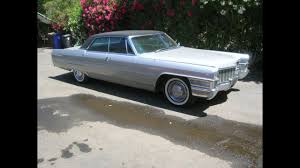 Image result for Starlight Silver 1965 Cadillac