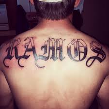 This is the main reason why the number of some people wear tattoo art on back as commemoration on their achievements in life or in order to enhance here are the names of celebrities who are proud enough to display their back tattoos Old English Last Name Tattoo On Back Novocom Top