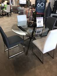 Dining Room Table Glass Table Silver Centerpiece Gray Chairs White Chairs Rooms To Go Dining Room Set Glass Dining Room Table Rooms To Go Dining Room Table