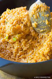 Zesty Cheesy Enchilada Rice Recipe Rice Side Dishes Cheesy Enchiladas Cheesy Rice Recipes