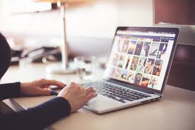 24 person on computer icons. Person Using Laptop Computer During Daytime Free Stock Photo