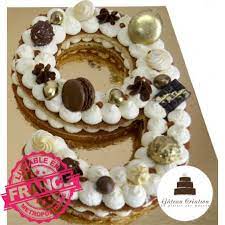 Ajouter peu à peu le verre de lait, le verre d'huile, la levure, puis la farine. Number Cake