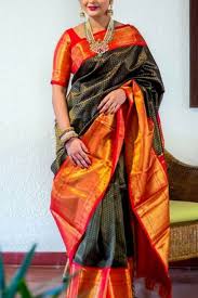 Facebook gives people the power to share. Dashing Black Orange Colored Soft Silk Saree Cd174