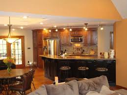 Uniting a kitchen with a dining space and also a living space will let you have cooler parties or invite the whole family that will interact while cooking, eating and having. Open Kitchen Design With Living Room Ideas Backside Gallery