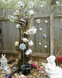 Tea Tree Make Your Own Alice In Wonderland Garden Spot Shopping List Old Tree Stump Or Fake Tree To Tea Pots Art Alice In Wonderland Garden Whimsical Garden