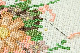 Winnie the pooh's eeyore animals animation characters disney donkey eeyore horses kids winnie the pooh. Closeup Of Needle Put Into Cross Stitch Embroidery Stock Photo Picture And Royalty Free Image Image 7997445