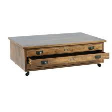 Mango wood has an easy appeal that makes it well suited to just about any space in the home, whether you choose a mango wood table for the dining room, a mango wood end or coffee table for the living room or a mango wood nightstand for the bedroom. Solid Mango Wood 3 Drawer Wheeled Coffee Table Hipster Maisons Du Monde