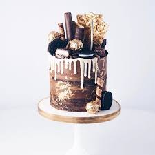 Black And White Drip Cake For Men Chocolate Freak Cake Chocolate Cake With A White Belgian Chocolate Drip Gold Painted Ferrero Rochers Chocolate Cake Decoration Chocolate Drip Cake Drip Cakes