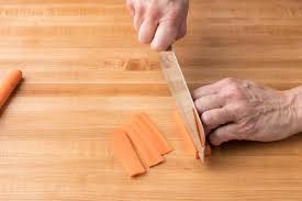 Trim the sides by taking a small slice from each side of the carrot to square it up so it lays flat on the cutting board. How To Easily Julienne Carrots