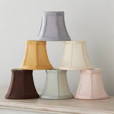 Lampshades for chandeliers come in the same materials you would expect to find for table lamp shades, including modern or traditional chandelier shades made of silk, linen, organza or paper, metal such as hammered copper or tin for industrial inspired chandelier shades or for chandelier shades that are uniquely you, we offer peacock or pheasant feather shades, bead chandelier shades, custom fabrics, leopard or zebra. 5 Dupioni Silk Bell Chandelier Shade Shades Of Light
