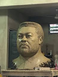 Sculpture made in Ghana added a...