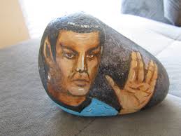 If you are looking for a challenge...  https://rockpainting101.com/rainbow-op-art/