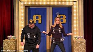 Amanda holden puts on a very leggy display in a patterned miniskirt. Britain S Got More Talent Amanda Holden Tries To Catch Balls In Glasses Daily Mail Online