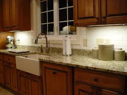 The goal in adding a backsplash is to elevate the look of the entire room, not just match a tile to the granite countertops. Kitchens Granite Countertop With Tile Backsplash Also Bedroom Sets Marble Tops Atmosphere Ideas Oak Kitchen Countertops Backsplashes White Island Sinks Gray Cabinets Show Apppie Org
