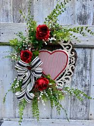 Target has 12 wreaths from which to choose this year, and the collection includes everything from a tassle and felt door decor to a tropical floral wreath, an olive leaf. Valentine Wreath Heart Wreath Valentine Decor Front Door Decor Front Door Wreath Valentine Decorations Valentine Day Wreaths Valentines Day Decorations