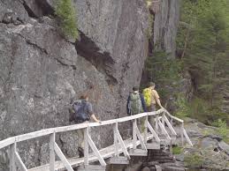 Follow the lake around to the right over boardwalks, ladders and rocks until you get to a t at the end of the lake. At Avalanche Lake The Hitch Up Matildas Have A Long History The Adirondack Almanack