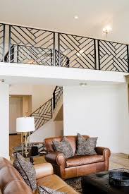 Welcome to our guide to stair railing ideas for interior designs. Modern Iron Staircase And Railing Loft Above Living Room Simple Living Room Home Staircase Design