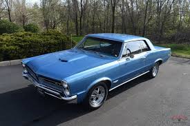 Image result for Canard Blue 1965 Mazda