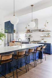 Photos of various kitchen islands with chairs and stools. How To Choose The Right Bar Stools For Your Kitchen Island Or Peninsula