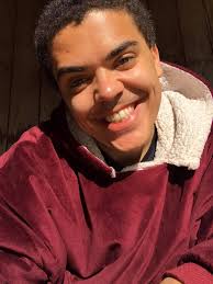 Hello! My name is Joshua and I can't not pose in photos. I'm non-binary. I  film police like it's a religion and am a student of Maoism. I believe in  fighting for