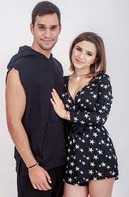 He is a celebrated tv actor. Cristina Ciobanasu Vlad Gherman Fashion Women High Neck Dress