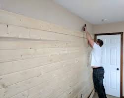 Repurpose wood flooring to create a unique focal point for any room. How To Build A Wood Plank Accent Wall Easy Diy Tutorial
