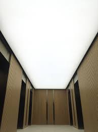 The easy up track and clip system installs surface mount ceiling tiles or planks directly to joists or an existing ceiling, maximizing ceiling height in a room. Illuminated Stretch Fabric Ceiling Panels Evenly Lit With Led Light Sheet