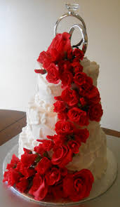 Know that wedding cake servings are usually smaller than regular cake servings. Red Roses Wedding Cake All Fondantgumpaste Roses Cake Was White Vanilla With Fresh Strawberry Filling And Simple Vanilla Buttercream Cakecentral Com