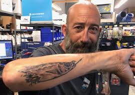 Bahati tattoos Diana Marua's name