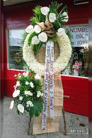 Maybe you would like to learn more about one of these? Wreath Arrangement Of White Anthuriums And Mums Funeral Flower Arrangements Delivery Flower Patch Online Flower Delivery Phillippines