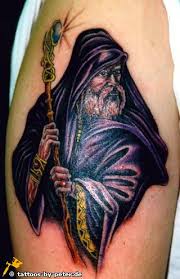 Like this one with the wizard casting a spell from a book. Tattoo Designs With Wizards Mediazink
