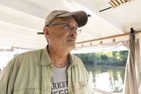 A Man and His Dog Watch Over New York's Hudson River