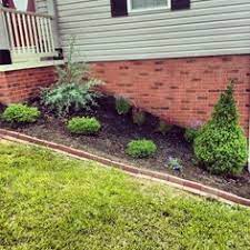 Today's vlog is all about getting your landscaping and flower beds in order around the house. 60 Bricks At Lowes Create The Perfect Border For A Flowerbed Landscape Borders Landscape Rock Landscape