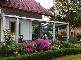 Faltturen Terrasse Idealer Wetterschutz Fur Den Aussenbereich Terrasse Terrassenverglasung Glasschiebetur