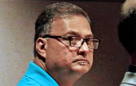 Ex-Oregon DOE administrator admits racketeering