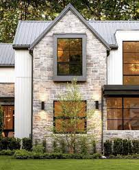 This design is unique because the house has no windows frames. Alison Strickland Modern Farmhouse Exterior House Designs Exterior Farmhouse Exterior