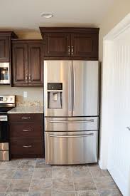 Cherry, oak, maple, alder, cedar and hickory are also popular choices for rustic kitchen cabinets. Deputy Son Red Oak With Espresso Stained Kitchen Sylvester Cabinetry