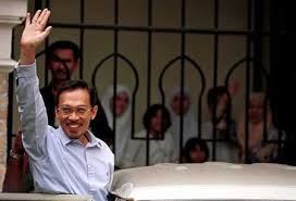 Haslinda amin sat down with anwar at his home in kuala lumpur where she asked him, if race and religion will still dominate malaysian politics or if it will end with the opposition in government. Ousted Malaysian Deputy Prime Minister Anwar Ibrahim Waves To The Supporters With His Wife Wanazizah