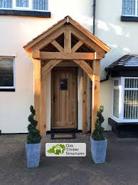 An alternative roof line would have been a shed roof which would have sloped downward toward the door making the roof lower than we would have liked. Solid Oak Porches Oak Timber Structures