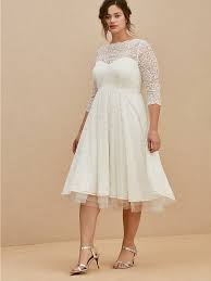 Looking for a plus size dress to wear to a wedding this spring? 20 Plus Size Wedding Dresses For Every Size Shape Style