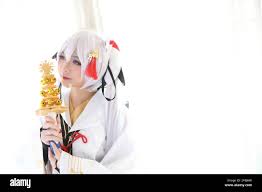 Japan anime cosplay , white japanese miko in white tone room Stock Photo -  Alamy