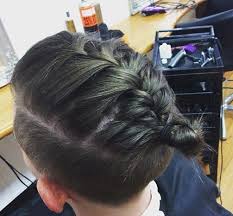 This voluminous hairstyle looks amazing with pink hair vine. Man Braid Hairstyle Guide New Braided Man Bun Trend Man Bun Hairstyle
