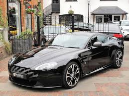 Image result for Jet Black 2011 Aston Martin
