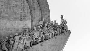 The monument's official website (google padrao dos descobrimentos) was extremely helpful and has an interactive page where you can click on an image of each sculpture to id them. Padrao Dos Descobrimentos By Pmem On Deviantart