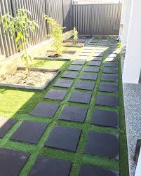 If laying on top of decking or concrete paving, you may want to use an underlay first, which will provide gentle cushioning and smooth over any. 400x400 Stepping Stones W Artificial Turf Insert And Matching Planter Boxes Turf Backyard Garden Artificial Lawn