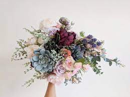 With fake flowers?insert silk flowers into the styrofoam, add ribbon around base and you've made a gorgeous bouquet. Keepsake Wedding Florals From The Faux Bouquets Fake Wedding Bouquet Wedding Flower Guide Silk Flower Bouquets