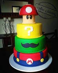 This mario cupcake cake was made by cute as a fox creations for her husband's 30th birthday, obviously he is a big mario fan. Super Mario Cake Ideas S Easy Super Mario Birthday Party Mario Bros Cake Super Mario Cake