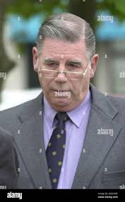 Consultant urologist John Gethin Roberts, 59, arrives at Swansea Crown  Court,