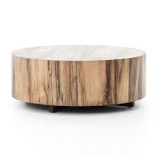 Each serves as a venue to display a collection of books or curios, while providing a convenient spot to rest a mug. Celeste Dillon Spalted Primavera Round Wood Coffee Table Big Little Lies Inspired Home Decor Popsugar Home Uk Photo 7